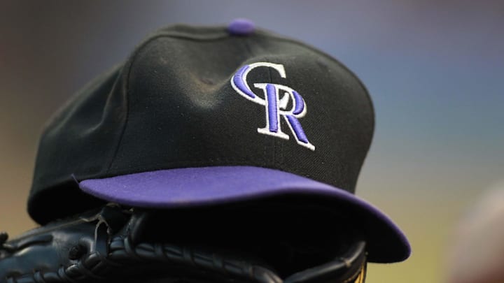 Jun 24, 2012; Arlington, TX, USA; Colorado Rockies hat and glove in the dugout during the game against the Texas Rangers at Rangers Ballpark. The Rangers beat the Rockies 4-2. Mandatory Credit: Tim Heitman-Imagn Images Jun 24, 2012; Arlington, TX, USA; Colorado Rockies hat and glove in the dugout during the game against the Texas Rangers at Rangers Ballpark. The Rangers beat the Rockies 4-2. Mandatory Credit: Tim Heitman-Imagn Images