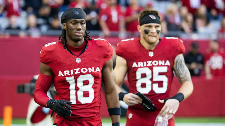 Arizona Cardinals wide receiver Marvin Harrison Jr. (18) and tight end Trey McBride (85) against the San Francisco 49ers at State Farm Stadium. 
