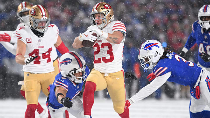 San Francisco 49ers running back Christian McCaffrey (23) is tackled by Buffalo Bills safety Taylor Rapp (9) and safety Damar Hamlin (3) in the second quarter at Highmark Stadium. San Francisco 49ers running back Christian McCaffrey (23) is tackled by Buffalo Bills safety Taylor Rapp (9) and safety Damar Hamlin (3) in the second quarter at Highmark Stadium.