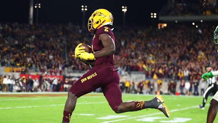 Nov 23, 2019; Tempe, AZ, USA; Arizona State Sun Devils wide receiver Brandon Aiyuk (2) scores a fourth quarter touchdown against the Oregon Ducks at Sun Devil Stadium. Mandatory Credit: Mark J. Rebilas-Imagn Images