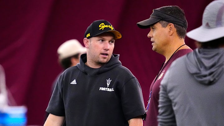 Arizona State head coach Kenny Dillingham talks with defensive coordinator Brian Ward during a practice at the Verde Dickey Dome in Tempe on Aug. 19, 2025. Arizona State head coach Kenny Dillingham talks with defensive coordinator Brian Ward during a practice at the Verde Dickey Dome in Tempe on Aug. 19, 2025.