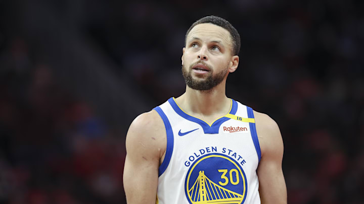 Dec 11, 2024; Houston, Texas, USA; Golden State Warriors guard Stephen Curry (30) looks up after a play during the fourth quarter against the Houston Rockets at Toyota Center.