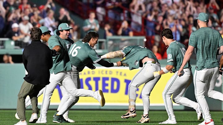 Aug 15, 2025; Boston, Massachusetts, USA; Boston Red Sox left fielder Jarren Duran (16) tries to pull off shortstop Trevor Story's (10) jersey after his walk-off RBI to end the ninth inning against the Miami Marlins at Fenway Park. Mandatory Credit: Eric Canha-Imagn Images Aug 15, 2025; Boston, Massachusetts, USA; Boston Red Sox left fielder Jarren Duran (16) tries to pull off shortstop Trevor Story's (10) jersey after his walk-off RBI to end the ninth inning against the Miami Marlins at Fenway Park. Mandatory Credit: Eric Canha-Imagn Images