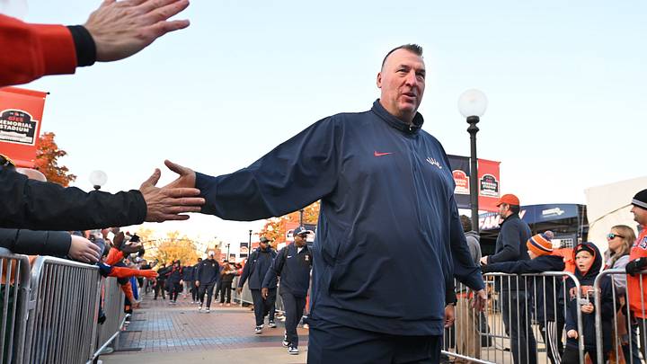 Nov 1, 2025; Champaign, Illinois, USA; Illinois Fighting Illini head coach Bret Bielema greets fans before an NCAA game against the Rutgers Scarlet Knights at Memorial Stadium. Mandatory Credit: Ron Johnson-Imagn Images Nov 1, 2025; Champaign, Illinois, USA; Illinois Fighting Illini head coach Bret Bielema greets fans before an NCAA game against the Rutgers Scarlet Knights at Memorial Stadium. Mandatory Credit: Ron Johnson-Imagn Images