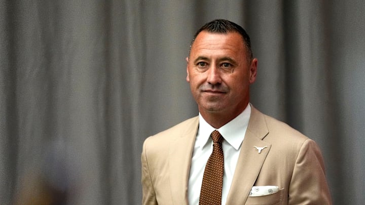 July 15, 2025; Atlanta, GA, USA; Texas head coach Steve Sarkisian waits off stage as he is introduced during SEC Media Days at the College Football Hall of Fame in Atlanta.