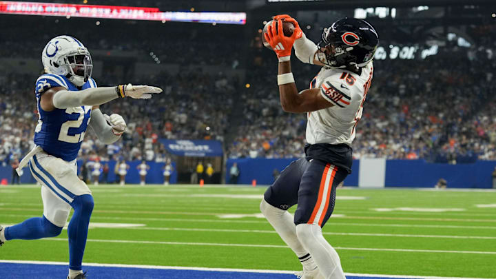 Chicago Bears wide receiver Rome Odunze (15) catches a pass in front of Indianapolis Colts cornerback Kenny Moore II (23) for a touchdown Sunday, Sept. 22, 2024, during a game against the Indianapolis Colts at Lucas Oil Stadium in Indianapolis.