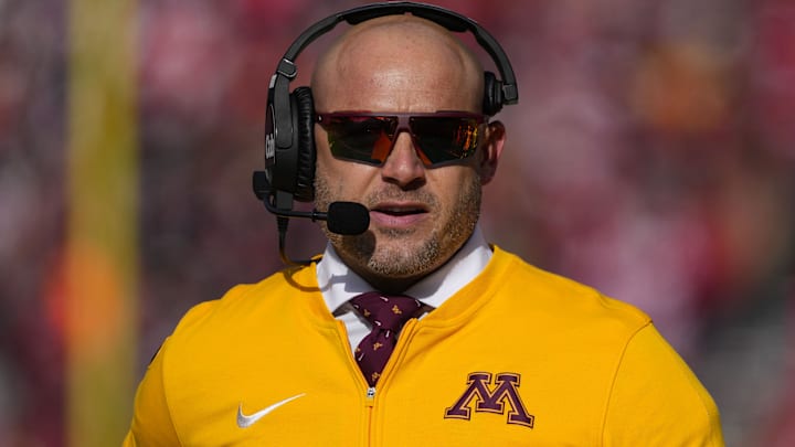 Nov 29, 2024; Madison, Wisconsin, USA;  Minnesota Golden Gophers head coach P.J. Fleck looks on during the first quarter against the Wisconsin Badgers at Camp Randall Stadium.