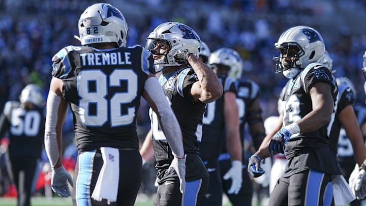 Carolina Panthers running back Chuba Hubbard celebrates his score with tight end Tommy Tremble during the first quarter against the Arizona Cardinals