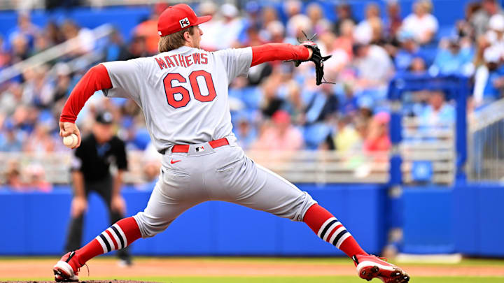 St. Louis Cardinals starting pitcher Quinn Mathews (60) throws against the Toronto Blue Jays in the first inning of a spring training game at TD Ballpark in Dunedin, Fla., on Feb. 25, 2025. 