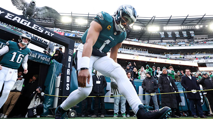 Jan 11, 2026; Philadelphia, PA, USA; Philadelphia Eagles quarterback Jalen Hurts (1) runs out of the tunnel for action against the San Francisco 49ers in an NFC Wild Card Round game at Lincoln Financial Field. Mandatory Credit: Bill Streicher-Imagn Images