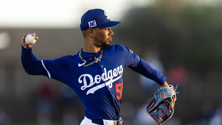 Mar 4, 2025; Phoenix, Arizona, USA; Los Angeles Dodgers shortstop Mookie Betts (50) against the Cincinnati Reds during a spring training game at Camelback Ranch-Glendale. Mandatory Credit: Mark J. Rebilas-Imagn Images