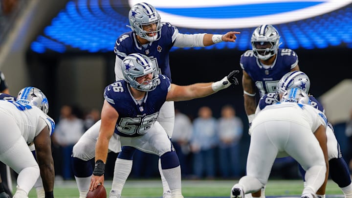 Dallas Cowboys C Cooper Beebe and QB Dak Prescott signal prior to the snap during the first quarter against the Lions.