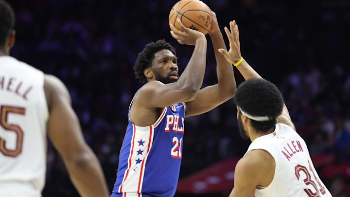 Jan 14, 2026; Philadelphia, Pennsylvania, USA; Philadelphia 76ers center Joel Embiid (21) shoots against Cleveland Cavaliers center Jarrett Allen (31) during the second quarter at Xfinity Mobile Arena. Mandatory Credit: Bill Streicher-Imagn Images