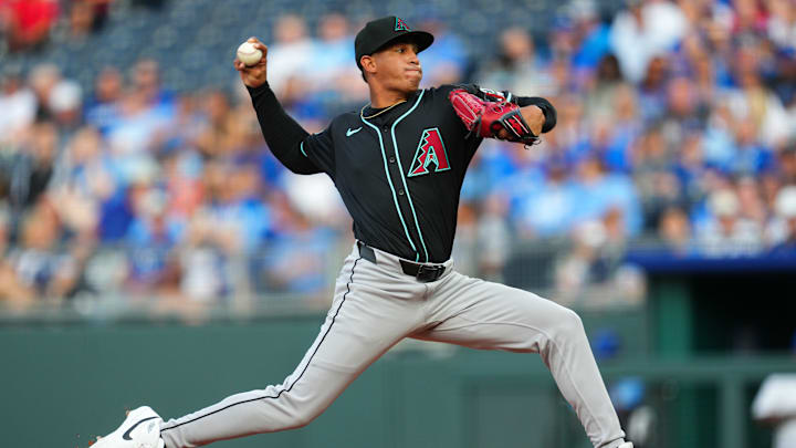Jul 22, 2024; Kansas City, Missouri, USA; Arizona Diamondbacks starting pitcher Yilber Diaz (45) pitches during the first inning against the Kansas City Royals at Kauffman Stadium. Mandatory Credit: Jay Biggerstaff-Imagn Images Jul 22, 2024; Kansas City, Missouri, USA; Arizona Diamondbacks starting pitcher Yilber Diaz (45) pitches during the first inning against the Kansas City Royals at Kauffman Stadium. Mandatory Credit: Jay Biggerstaff-Imagn Images