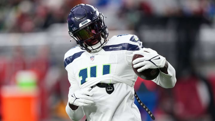Jan 7, 2024; Glendale, Arizona, USA; Seattle Seahawks wide receiver DK Metcalf (14) warms up prior to facing the Arizona Cardinals at State Farm Stadium. Mandatory Credit: Joe Camporeale-USA TODAY Sports