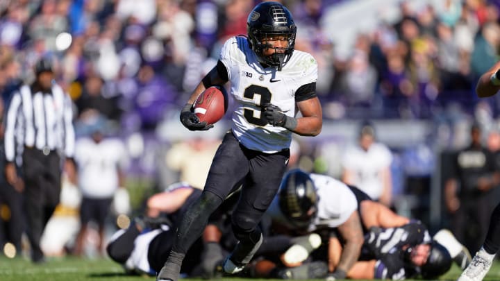 Running back Tyrone Tracy Jr. (3) runs with the ball against the Northwestern Wildcats at Ryan Field.  