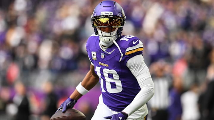 Nov 9, 2025; Minneapolis, Minnesota, USA; Minnesota Vikings wide receiver Justin Jefferson (18) warms up before the game against the Baltimore Ravens at U.S. Bank Stadium.