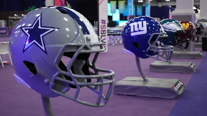 Feb 9, 2024; Las Vegas, NV, USA; Large Dallas Cowboys and New York Giants helmets at the NFL Experience at the Mandalay Bay South Convention Center. Mandatory Credit: Kirby Lee-Imagn Images