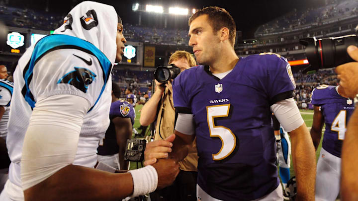 Aug 22, 2013; Baltimore, MD, USA; Baltimore Ravens quarterback Joe Flacco (5) shakes hands with Carolina Panthers quarterback Cam Newton (1) after the game at M&T Bank Stadium. Aug 22, 2013; Baltimore, MD, USA; Baltimore Ravens quarterback Joe Flacco (5) shakes hands with Carolina Panthers quarterback Cam Newton (1) after the game at M&T Bank Stadium.