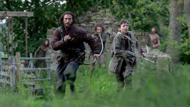 Jamie (Aaron Taylor-Johnson) and his son Spike (Alfie Williams) in Columbia Pictures' 28 YEARS LATER.