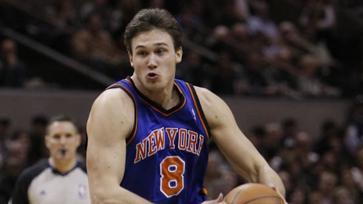 Jan 21, 2011; San Antonio, TX, USA; New York Knicks forward Danilo Gallinari (8) drives against the San Antonio Spurs during the second half at the AT&T Center. The Spurs won 101-92.  Mandatory Credit: Soobum Im-Imagn Images