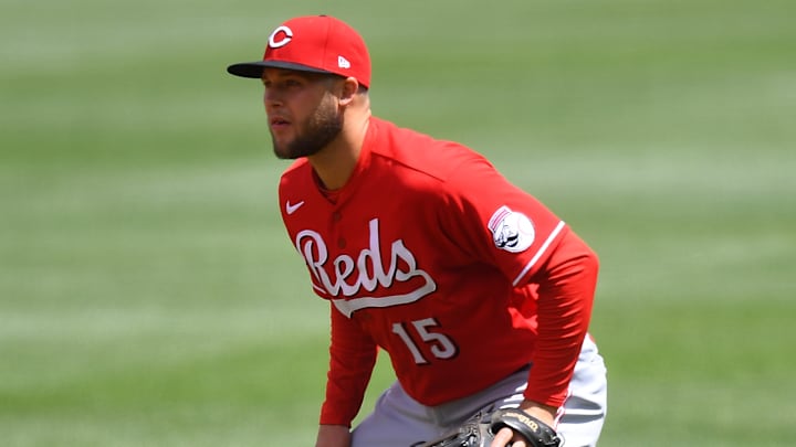 Nick Senzel readies in the Cincinnati Reds outfield.