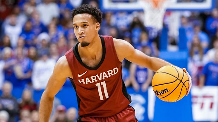 Harvard guard Evan Nelson (11) is transferring to Arizona. Harvard guard Evan Nelson (11) is transferring to Arizona.