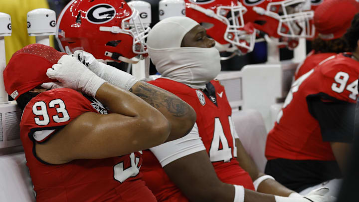 Jan 2, 2025; New Orleans, LA, USA; Georgia Bulldogs defensive lineman Tyrion Ingram-Dawkins (93) reacts on the bench in the final minute against the Notre Dame Fighting Irish during the fourth quarter at Caesars Superdome. Mandatory Credit: Geoff Burke-Imagn Images