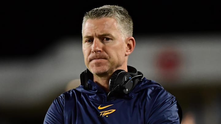 Sep 21, 2019; Fort Collins, CO, USA; Toledo Rockets head coach Jason Candle looks on during the first half against the Colorado State Rams at Sonny Lubrick Field at Canvas Stadium. Mandatory Credit: Ron Chenoy-Imagn Images Sep 21, 2019; Fort Collins, CO, USA; Toledo Rockets head coach Jason Candle looks on during the first half against the Colorado State Rams at Sonny Lubrick Field at Canvas Stadium. Mandatory Credit: Ron Chenoy-Imagn Images