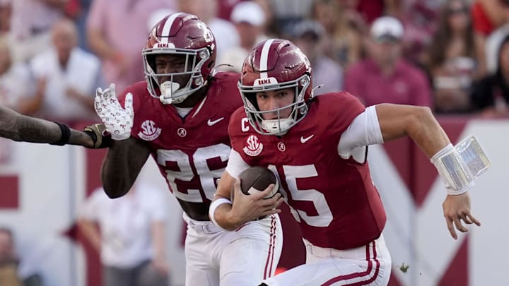 Alabama quarterback Ty Simpson (15) runs the ball after being forced out of the pocket by the Vanderbilt rush at Saban Field at Bryant-Denny Stadium. Alabama downed Vanderbilt 30-14. Credit: Gary Cosby Jr.-Imagn Images