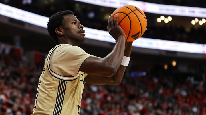 Jan 17, 2026; Raleigh, North Carolina, USA; Georgia Tech Yellow Jackets forward Kowacie Reeves Jr. (14) shoots a three pointer basket during the first half of the game against the NC State Wolfpack at Lenovo Center. Jan 17, 2026; Raleigh, North Carolina, USA; Georgia Tech Yellow Jackets forward Kowacie Reeves Jr. (14) shoots a three pointer basket during the first half of the game against the NC State Wolfpack at Lenovo Center.