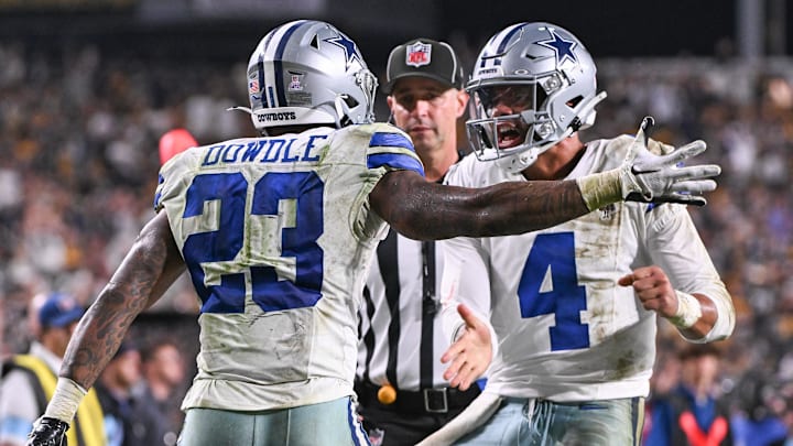 Dallas Cowboys running back Rico Dowdle celebrates a touchdown with quarterback Dak Prescott against the Pittsburgh Steelers.