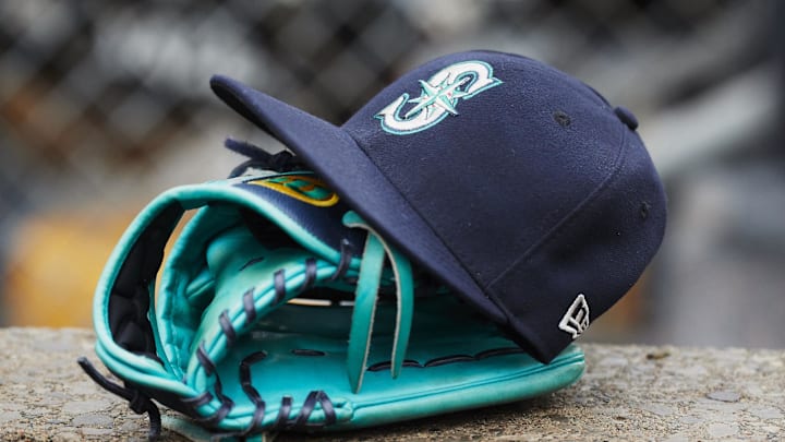 May 12, 2018; Detroit, MI, USA; Hat and glove of Seattle Mariners center fielder Dee Gordon (9) sits in dugout during the third inning against the Detroit Tigers at Comerica Park. Mandatory Credit: Rick Osentoski-Imagn Images