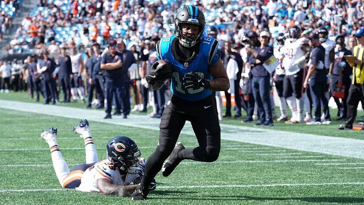 Panthers receiver Jalen Coker scores despite a last-ditch dive by Tyrique Stevenson. Panthers receiver Jalen Coker scores despite a last-ditch dive by Tyrique Stevenson.