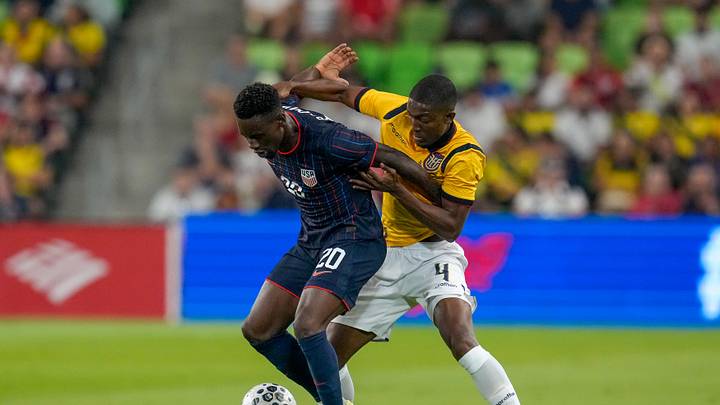 Oct 10, 2025; Austin, Texas, USA; United States forward Folarin Balogun (20) works against Ecuador defender Joel Ordonez (4) during the first half at Q2 Stadium. Mandatory Credit: Scott Coleman-Imagn Images