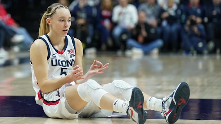 Jan 22, 2025; Storrs, Connecticut, USA; UConn Huskies guard Paige Bueckers (5) reacts after her three point basket and being fouled by the Villanova Wildcats in the first half at Harry A. Gampel Pavilion. Mandatory Credit: David Butler II-Imagn Images