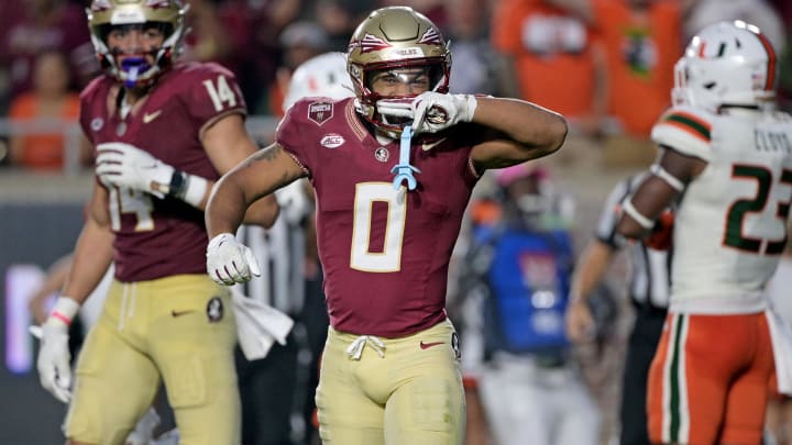 Nov 11, 2023; Tallahassee, Florida, USA; Florida State Seminoles wide receiver Ja'Khi Douglas (0) celebrates a big play against the Miami Hurricanes in the second half at Doak S. Campbell Stadium. Mandatory Credit: Melina Myers-USA TODAY Sports