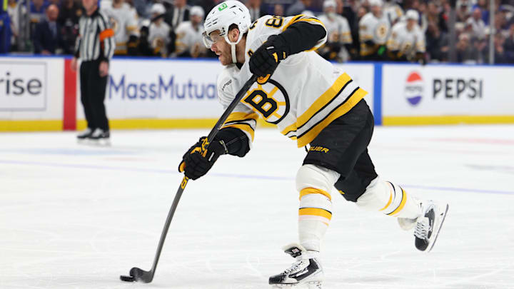 Apr 28, 2026; Buffalo, New York, USA; Boston Bruins right wing David Pastrnak (88) takes a shot on goal during the first period against the Buffalo Sabres in game five of the first round of the 2026 Stanley Cup Playoffs at KeyBank Center. Mandatory Credit: Timothy T. Ludwig-Imagn Images