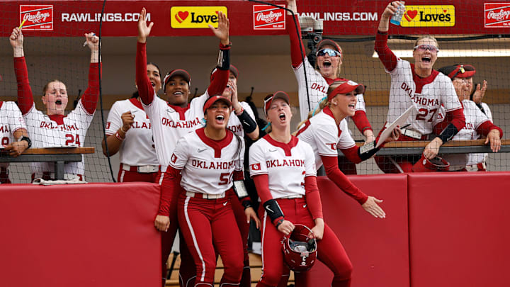 Oklahoma players celebrate after winning a replay challenge at Love's Field. Oklahoma players celebrate after winning a replay challenge at Love's Field.