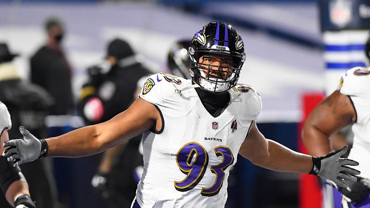 Jan 16, 2021; Orchard Park, New York, USA; Baltimore Ravens defensive end Calais Campbell (93) gestures while jogging on the field prior to an AFC Divisional Round game against the Buffalo Bills at Bills Stadium. Mandatory Credit: Rich Barnes-Imagn Images