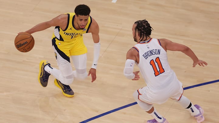 May 21, 2025; New York, New York, USA; Indiana Pacers guard Tyrese Haliburton (0) controls the ball against New York Knicks guard Jalen Brunson (11) in overtime during game one of the eastern conference finals for the 2025 NBA Playoffs at Madison Square Garden. Mandatory Credit: Brad Penner-Imagn Images