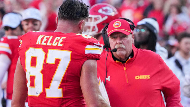 Nov 10, 2024; Kansas City, Missouri, USA; Kansas City Chiefs tight end Travis Kelce (87) talks with head coach Andy Reid against the Denver Broncos during the second half at GEHA Field at Arrowhead Stadium. Mandatory Credit: Denny Medley-Imagn Images