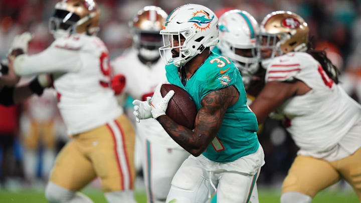 Miami Dolphins running back Raheem Mostert (31) runs the ball against the San Francisco 49ers during second half at Hard Rock Stadium in the 2024 season.