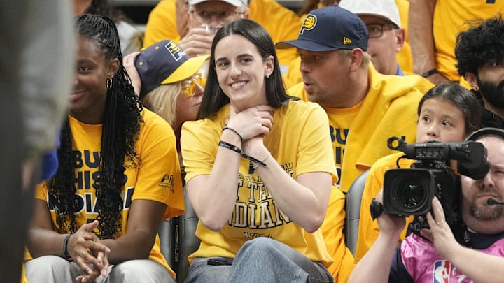 Jun 11, 2025; Indianapolis, Indiana, USA; Caitlin Clark attends game three of the 2025 NBA Finals between the Oklahoma City Thunder and the Indiana Pacers at Gainbridge Fieldhouse. Mandatory Credit: Kyle Terada-Imagn Images