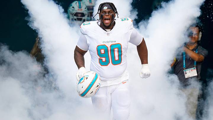 Miami Dolphins defensive tackle Kenneth Grant (90) runs on the field before a game against the Buffalo Bills at Hard Rock Stadium last season. Miami Dolphins defensive tackle Kenneth Grant (90) runs on the field before a game against the Buffalo Bills at Hard Rock Stadium last season.