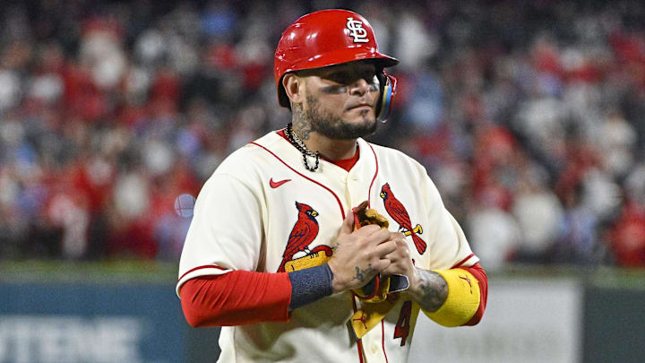 Oct 8, 2022; St. Louis, Missouri, USA; St. Louis Cardinals catcher Yadier Molina (4) walks off the field after hitting a single for his final postseason at bat in the ninth inning against the Philadelphia Phillies during game two of the Wild Card series for the 2022 MLB Playoffs at Busch Stadium. Mandatory Credit: Jeff Curry-Imagn Images Oct 8, 2022; St. Louis, Missouri, USA; St. Louis Cardinals catcher Yadier Molina (4) walks off the field after hitting a single for his final postseason at bat in the ninth inning against the Philadelphia Phillies during game two of the Wild Card series for the 2022 MLB Playoffs at Busch Stadium. Mandatory Credit: Jeff Curry-Imagn Images
