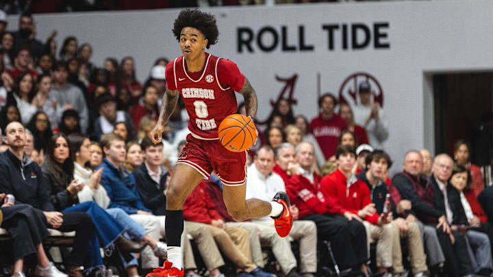 Jan 25, 2025; Tuscaloosa, Alabama, USA; Alabama Crimson Tide guard Labaron Philon (0) drives the ball against the LSU Tigers during the second half at Coleman Coliseum. Mandatory Credit: Will McLelland-Imagn Images