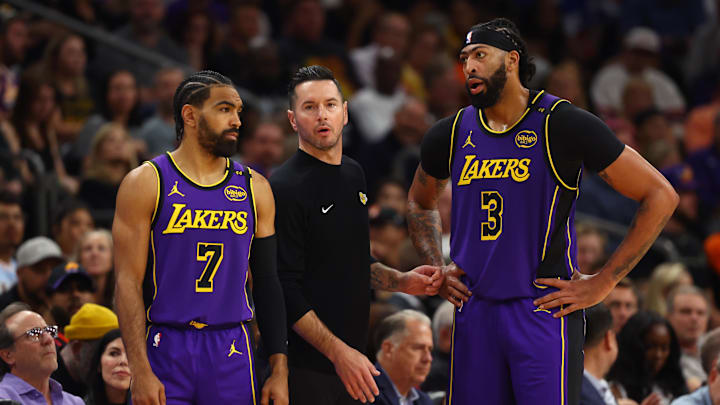 Los Angeles Lakers head coach JJ Redick with guard Gabe Vincent (7) and forward Anthony Davis (3) against the Phoenix Suns at Footprint Center. Mandatory Credit: Mark J. Rebilas-Imagn Images