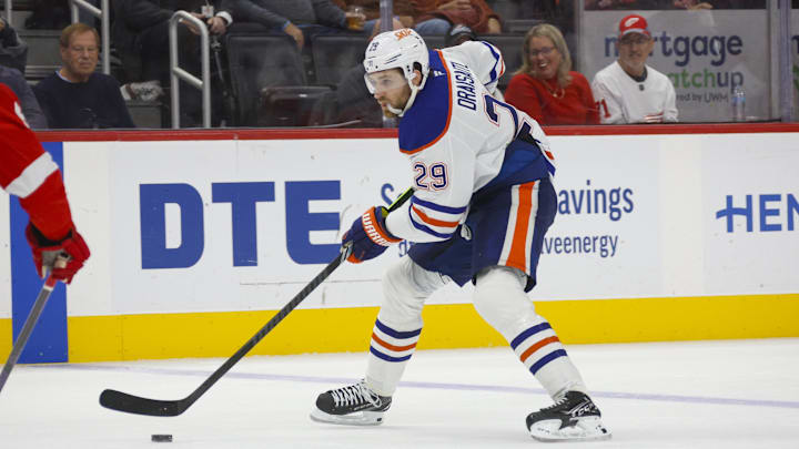 Oct 27, 2024; Detroit, Michigan, USA; Edmonton Oilers center Leon Draisaitl (29) handles the puck during the third period of the game against the Detroit Red Wings at Little Caesars Arena. Mandatory Credit: Brian Bradshaw Sevald-Imagn Images Oct 27, 2024; Detroit, Michigan, USA; Edmonton Oilers center Leon Draisaitl (29) handles the puck during the third period of the game against the Detroit Red Wings at Little Caesars Arena. Mandatory Credit: Brian Bradshaw Sevald-Imagn Images
