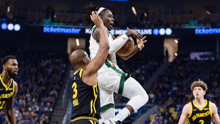 Dec 19, 2023; San Francisco, California, USA; Boston Celtics guard Jrue Holiday (4) drives past